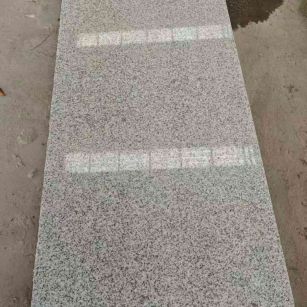 益阳芝麻白光面毛板